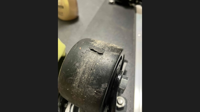 Damaged caster on amp case