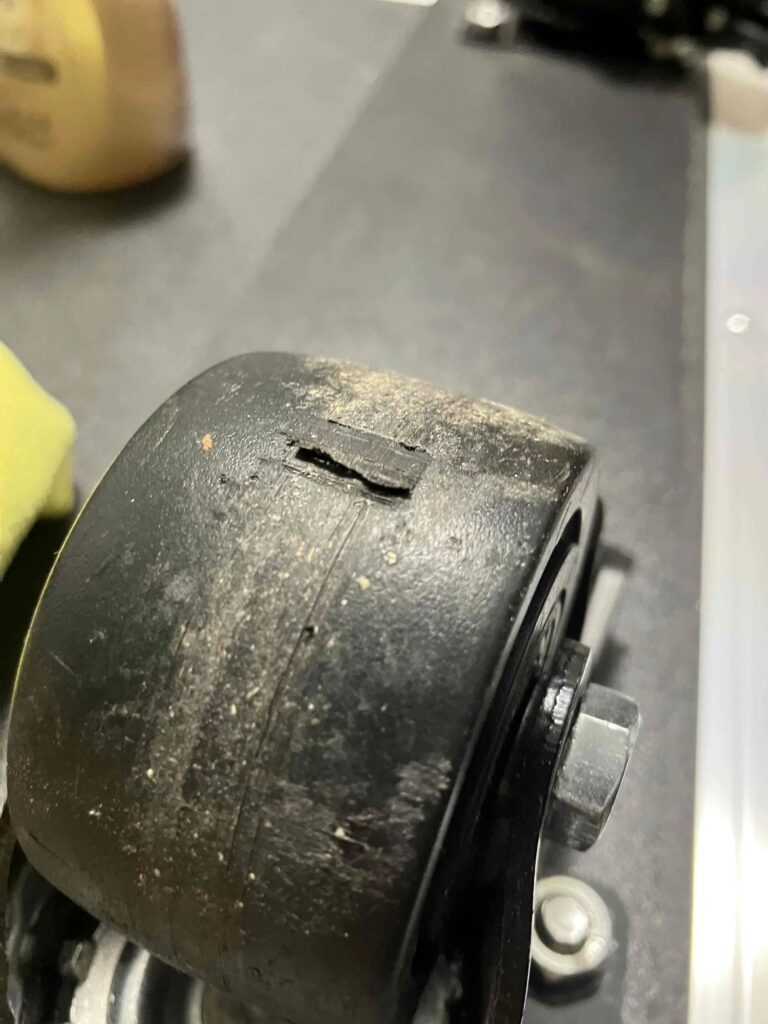 damaged-caster-on-amp-case